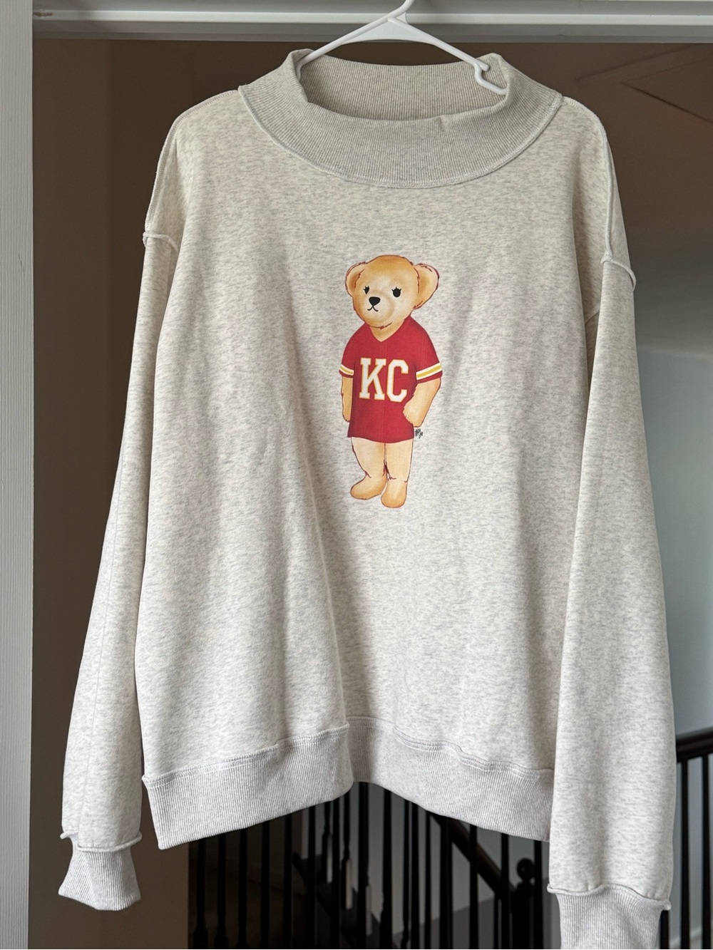 Reversible Oversized Mock Neck KC Bear Graphic Cream Sweatshirt